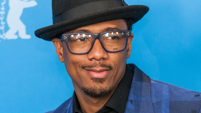 Nick Canon smiles on the red carpet