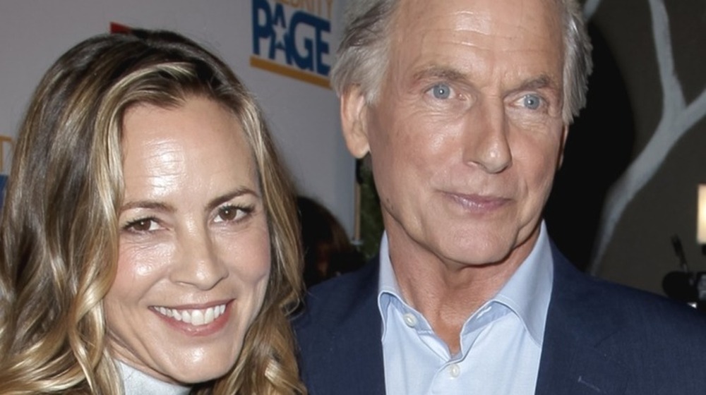 Maria Bello and Mark Harmon smiling