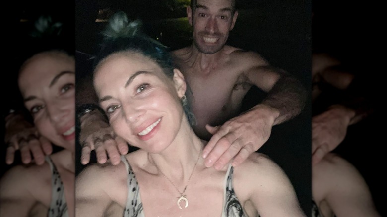 Whitney Cummings and Alex Barnes taking selfie