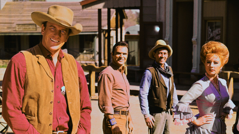 Amanda Blake gazing at James Arness in a 