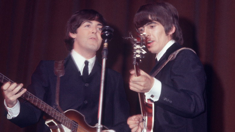 Paul McCartney and George Harrison performing together in 1970.