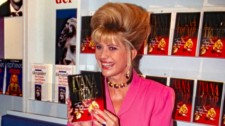 Ivana Trump smiling and holding up her book at 1994 Frankfurt Book Fair