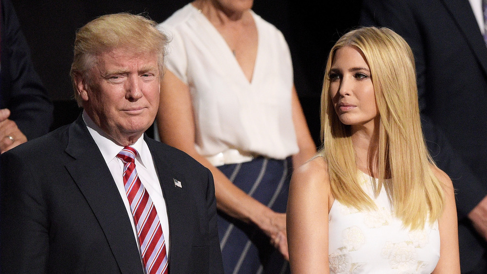 Ivanka Trump looking at Donald Trump at a rally