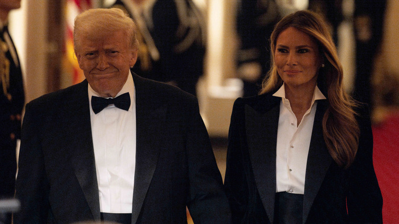 Donald Trump and Melania Trump wearing black tuxes