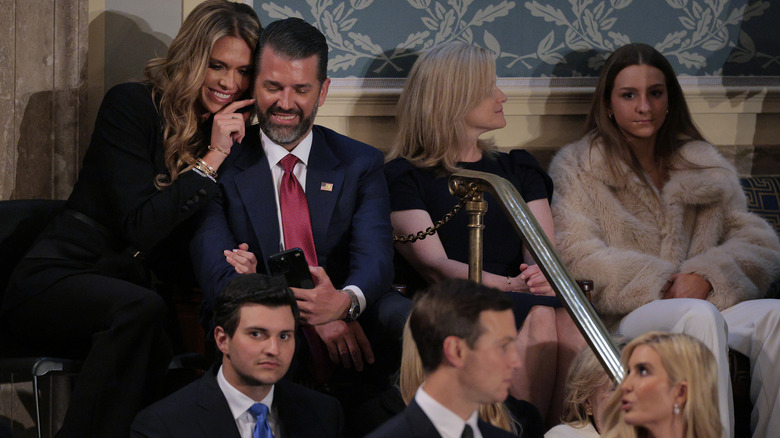 Bettina Anderson and Don Jr. take selfies at the inauguration.
