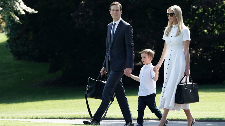 Ivanka Trump and her family, walking outside