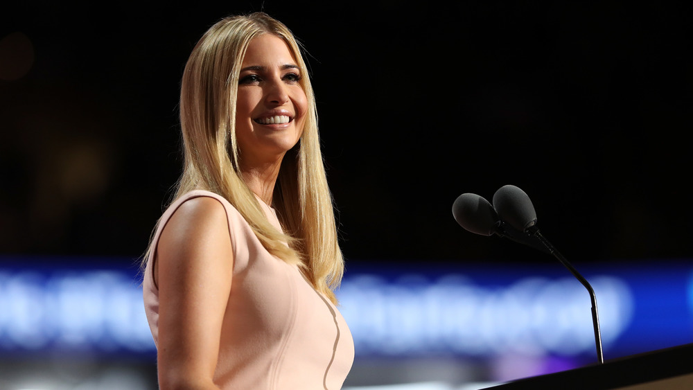 Ivanka Trump smiling at podium