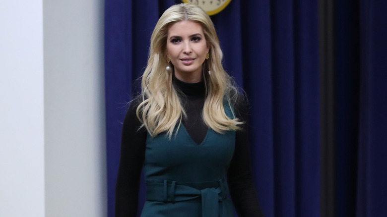 Ivanka Trump walking in green dress
