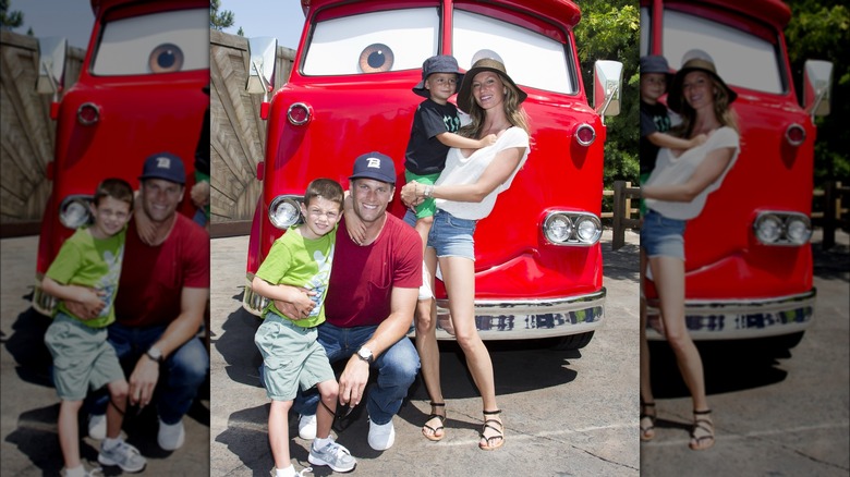 Gisele Bündchen, Tom Brady, and kids posing with van