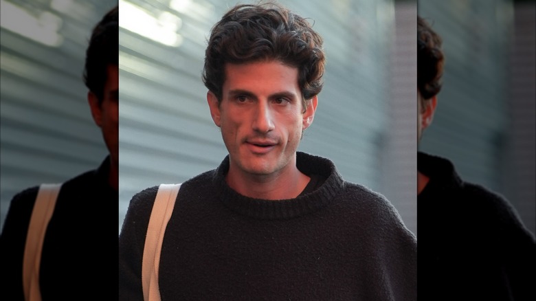 Jack Schlossberg walking to a tennis match.