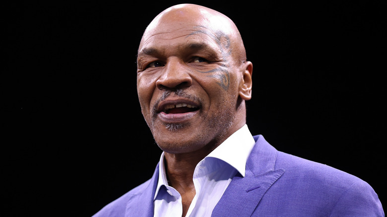 Mike Tyson purple suit