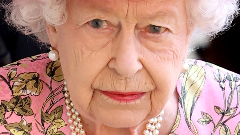 Queen Elizabeth looking sternly