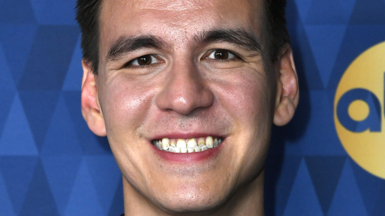 James Holzhauer smiles on Jeopardy set