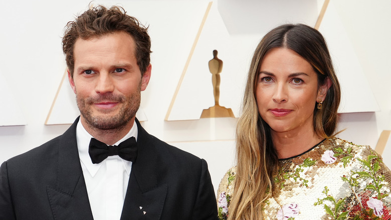 Jamie Dornan and Amelia Warner pose together