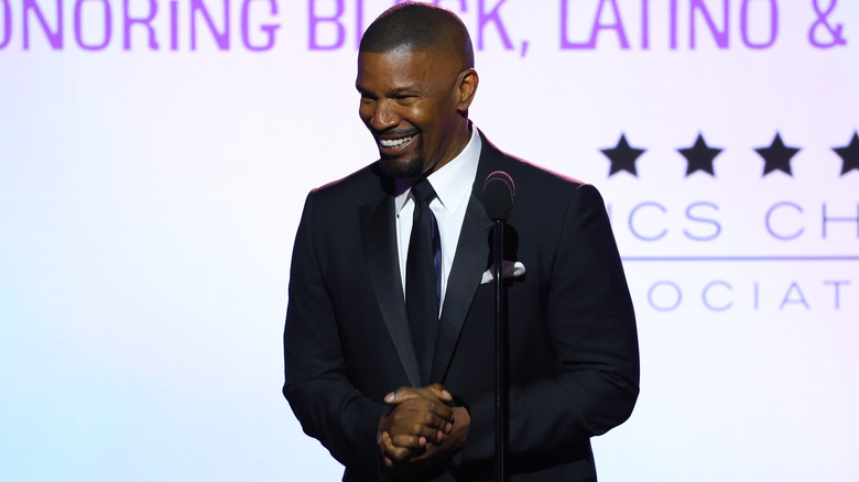 Jamie Foxx smiling onstage
