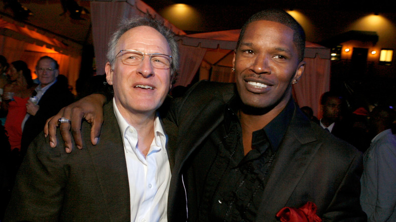Jamie Foxx with arm around Michael Mann