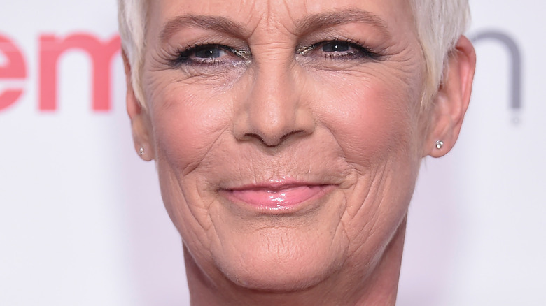 Jamie Lee Curtis white hair smiling