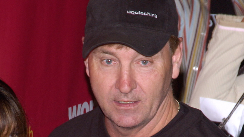 Jamie Spears wears a black baseball hat