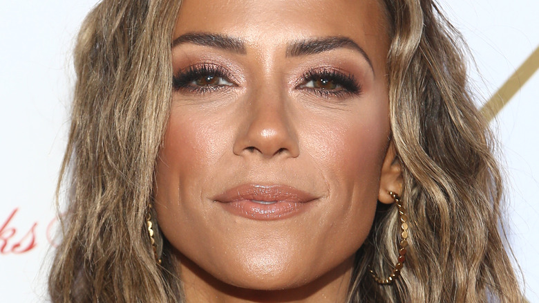 Jana Kramer looking at camera