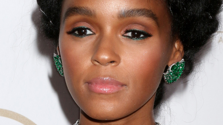 Janelle Monae posing