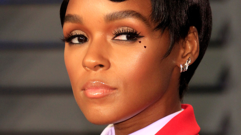 Janelle Monáe gazing to the side