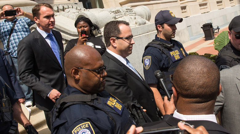 Jared Fogle walks out of the courthouse after pleading guilty