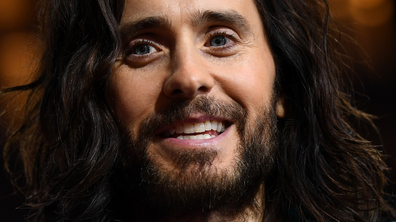 jared leto laughing on House of Gucci premiere red carpet