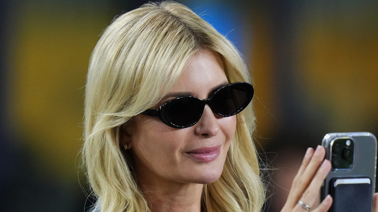 Ivanka Trump looking at her phone