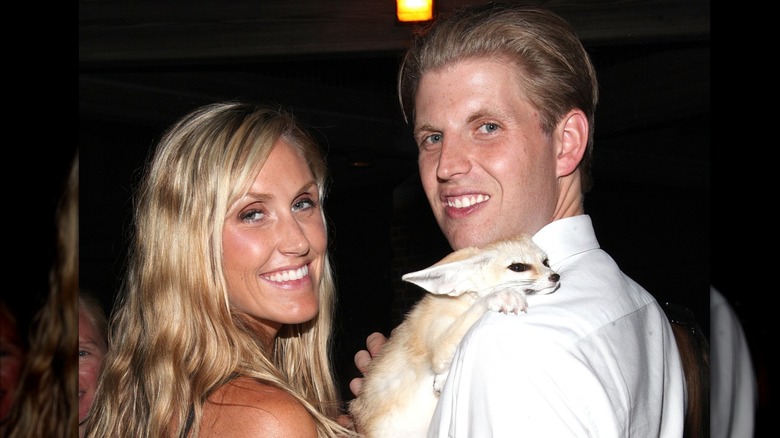 Lara Trump and Eric Trump holding a fox