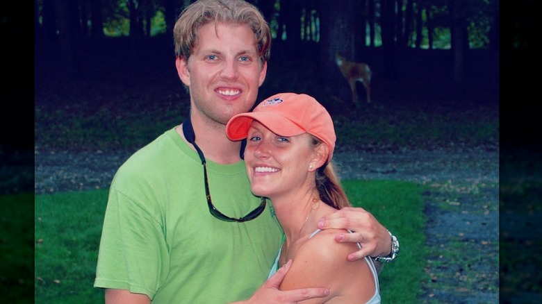 Lara Trump and Eric Trump hug wear sport ensembles and hug in a throwback photo.