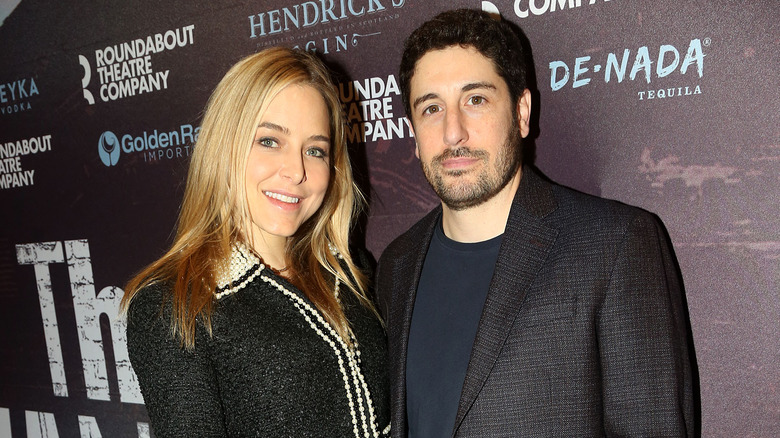Jenny Mollen and Jason Biggs wearing black
