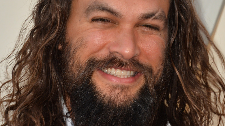 Jason Momoa grinning big