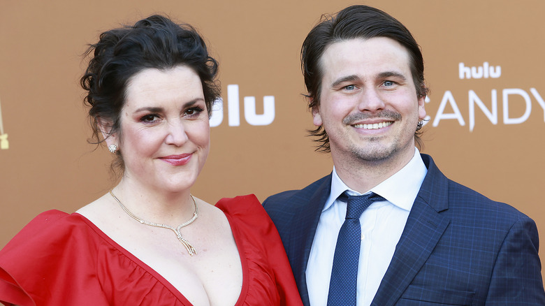 Jason Ritter and Melanie Lynskey red dress