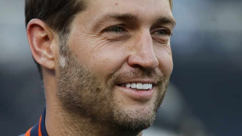 Jay Cutler smiles at a Cubs game