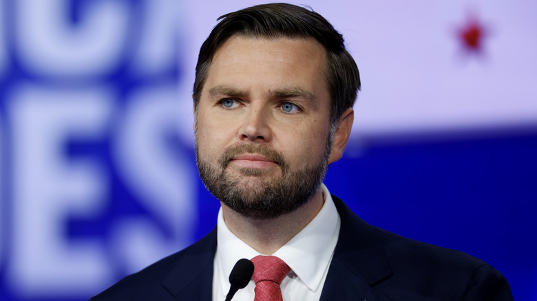 JD Vance wearing a red tie