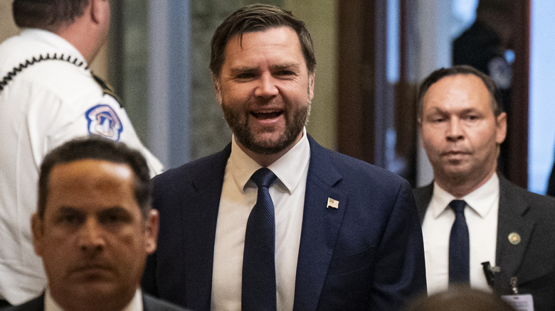 JD Vance looking cheerful as he enters the Capitol.