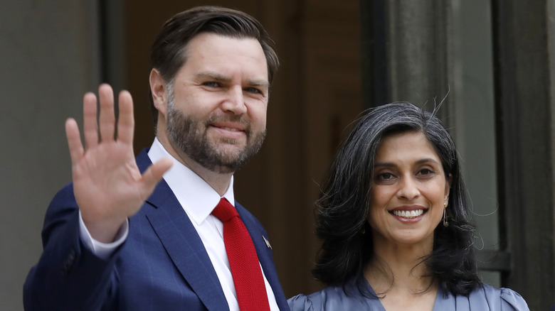 JD Vance waving next to Usha Vance