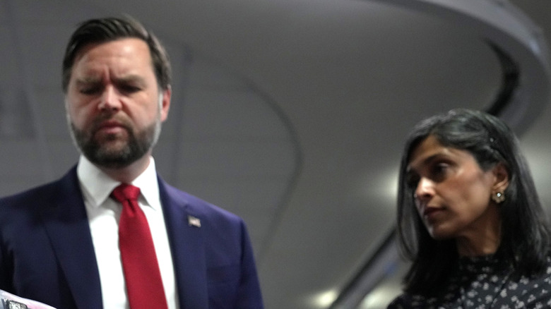 JD Vance standing with Usha Vance