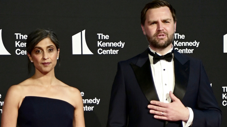 Usha Vance and JD Vance posing on the red carpet