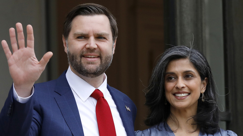 JD Vance waving next to Usha Vance
