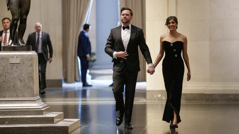 JD and Usha Vance walking hand-in-hand