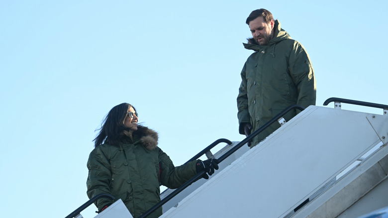 JD Vance deplaning behind Usha Vance