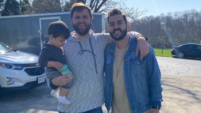Cory Bowman posing with his brother JD Vance and nephew Vivek Vance.