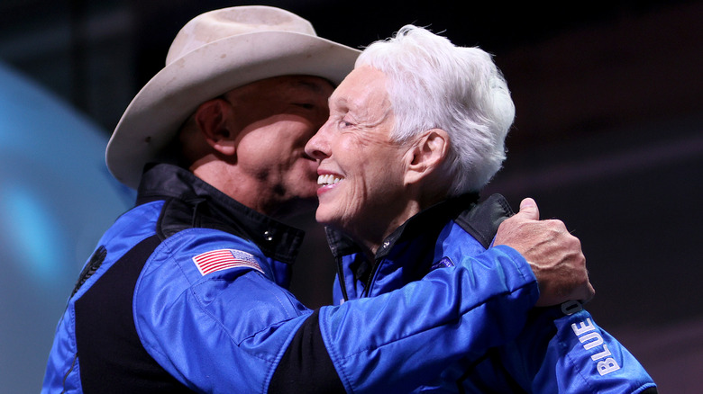 Jeff Bezos hugs Wally Funk during their space trip