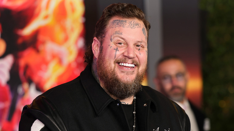Jelly Roll smiling at an event