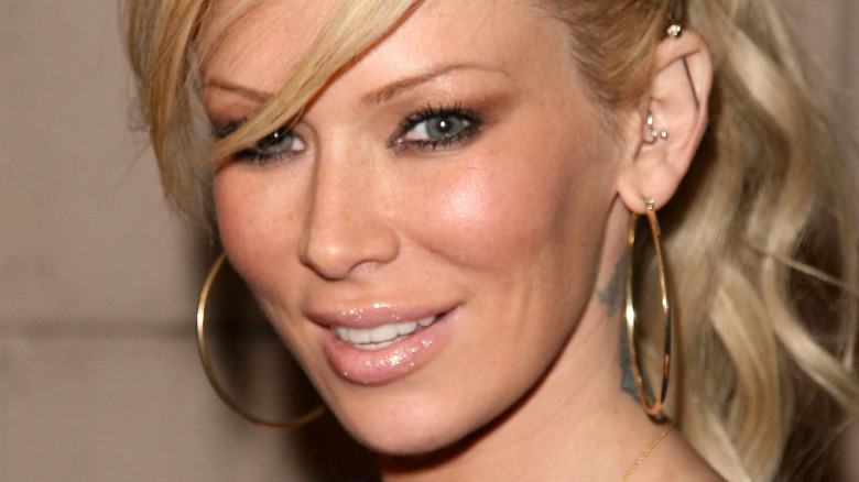 Jenna Jameson poses in good hoop earrings