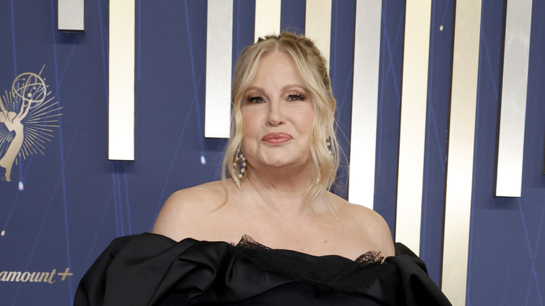 Jennifer Coolidge with lips pressed together