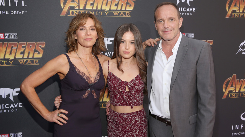 Jennifer Grey, Stella Gregg, and Clark Gregg posing