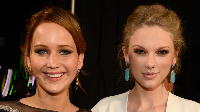 Jennifer Lawrence and Taylor Swift smiling