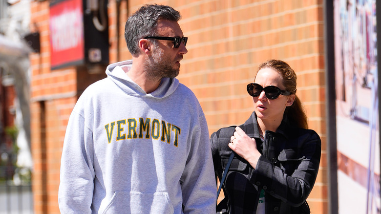Jennifer Lawrence and Cooke Maroney walking